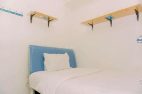 Comfort 2BR at 22nd Floor Menara Kebon Jeruk Apartment By Travelio